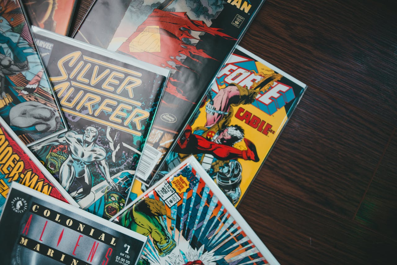 From above of huge collection of various retro comic books with colorful covers placed on floor